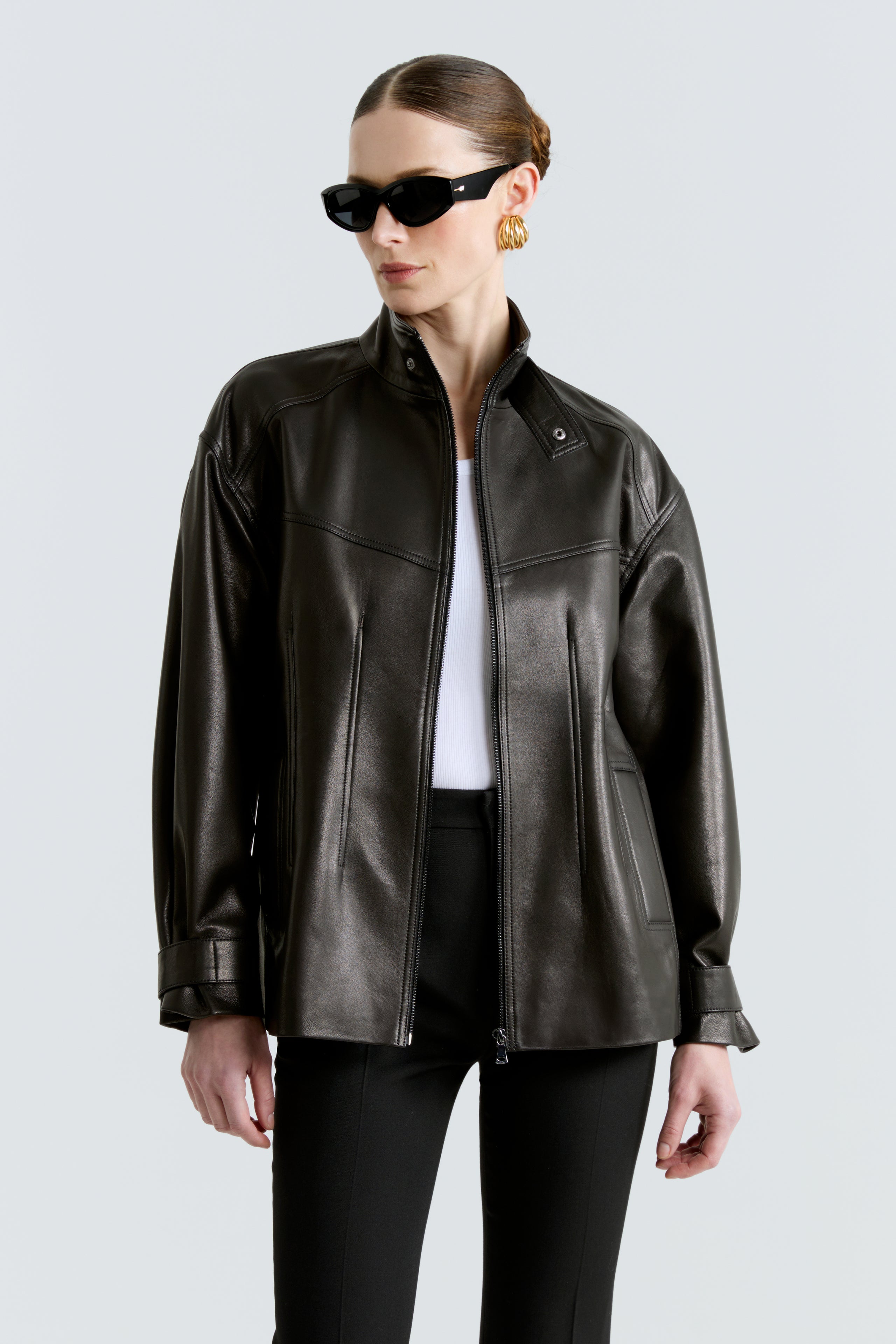 Model is wearing the Rue Black Leather Bomber Jacket Close Up