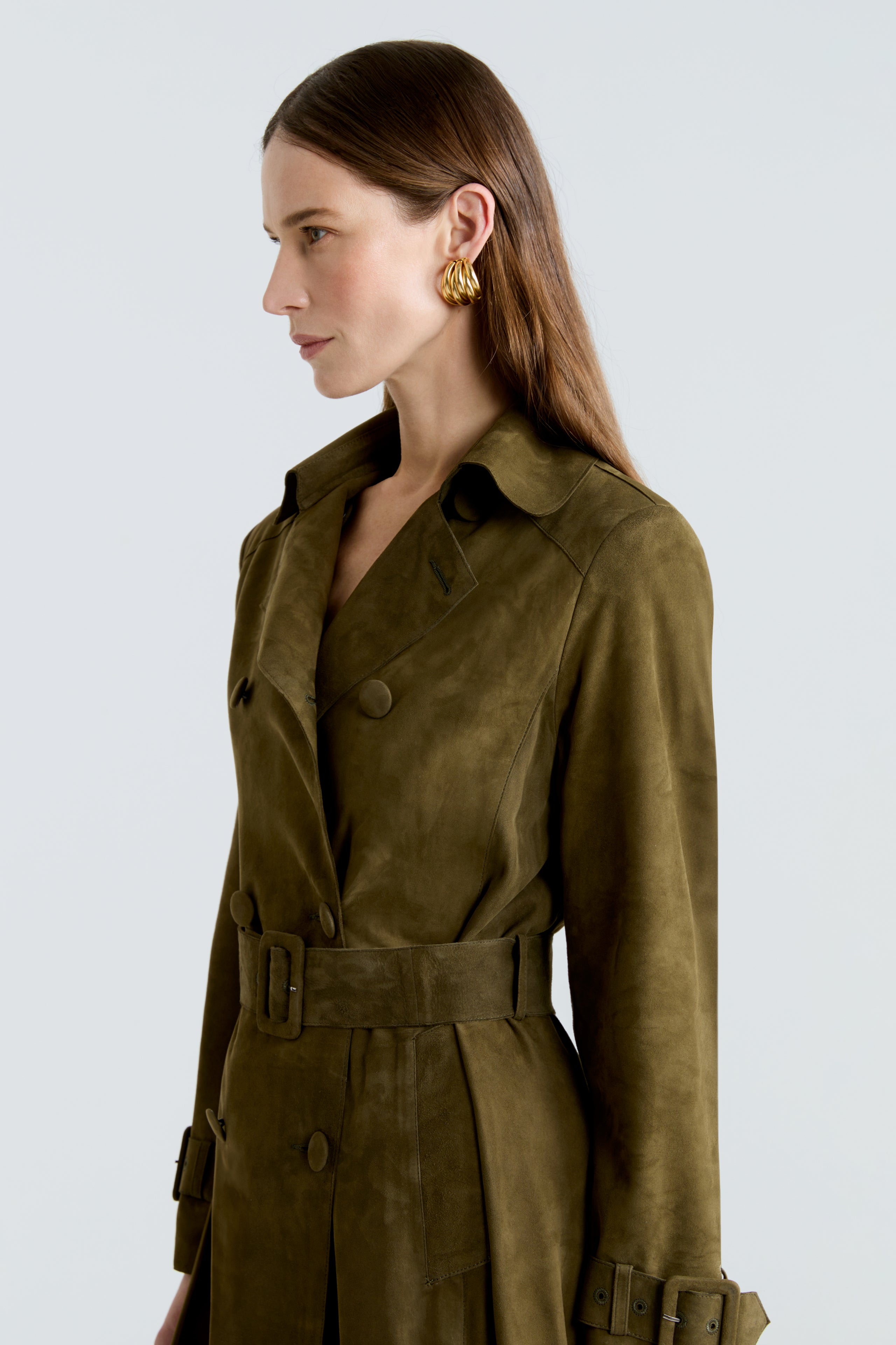 Model is wearing the Tate Olive Everyday Suede Trench Coat Close Up