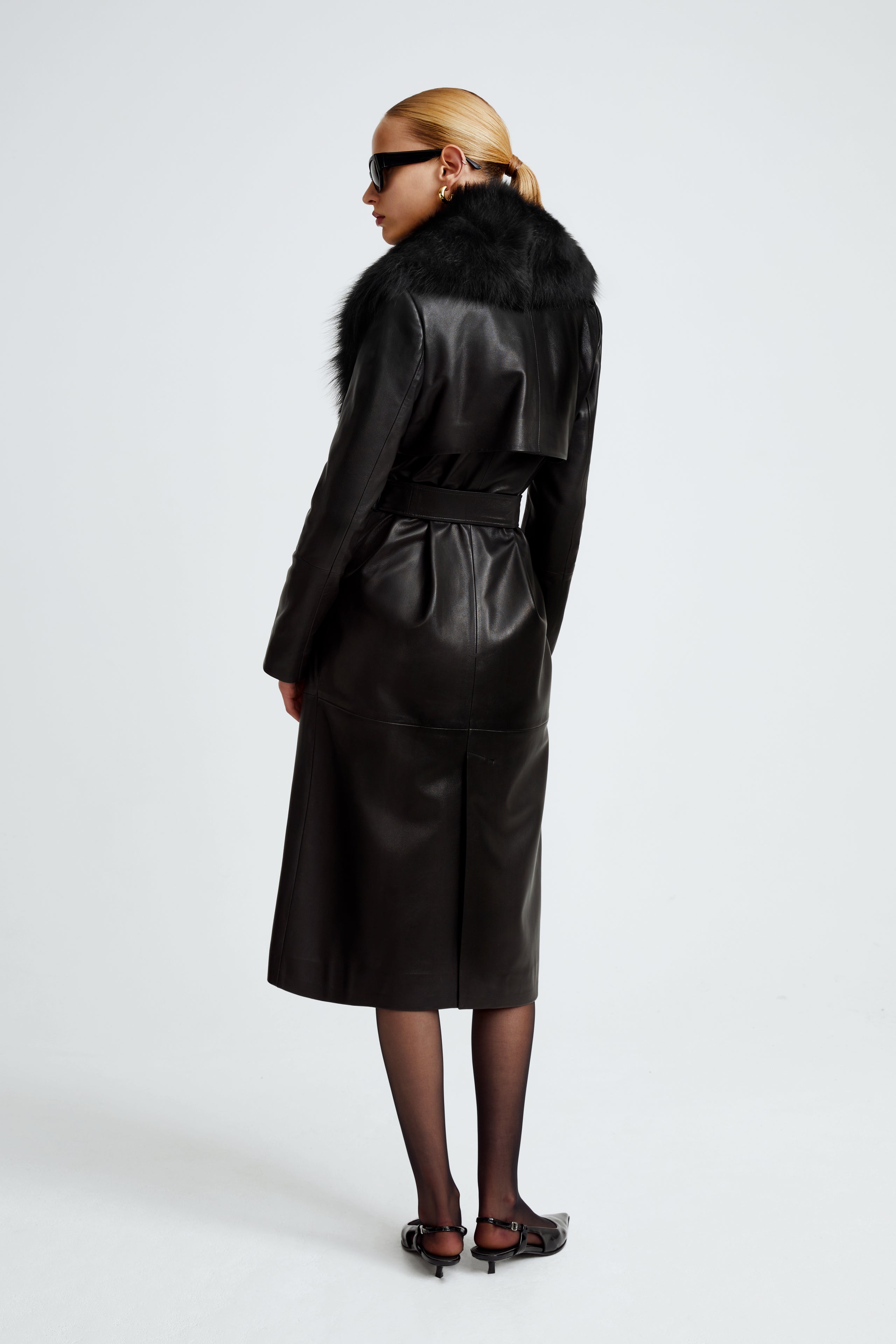 Model is wearing the Uptown Girl Black Sophisticated Leather Trench Back