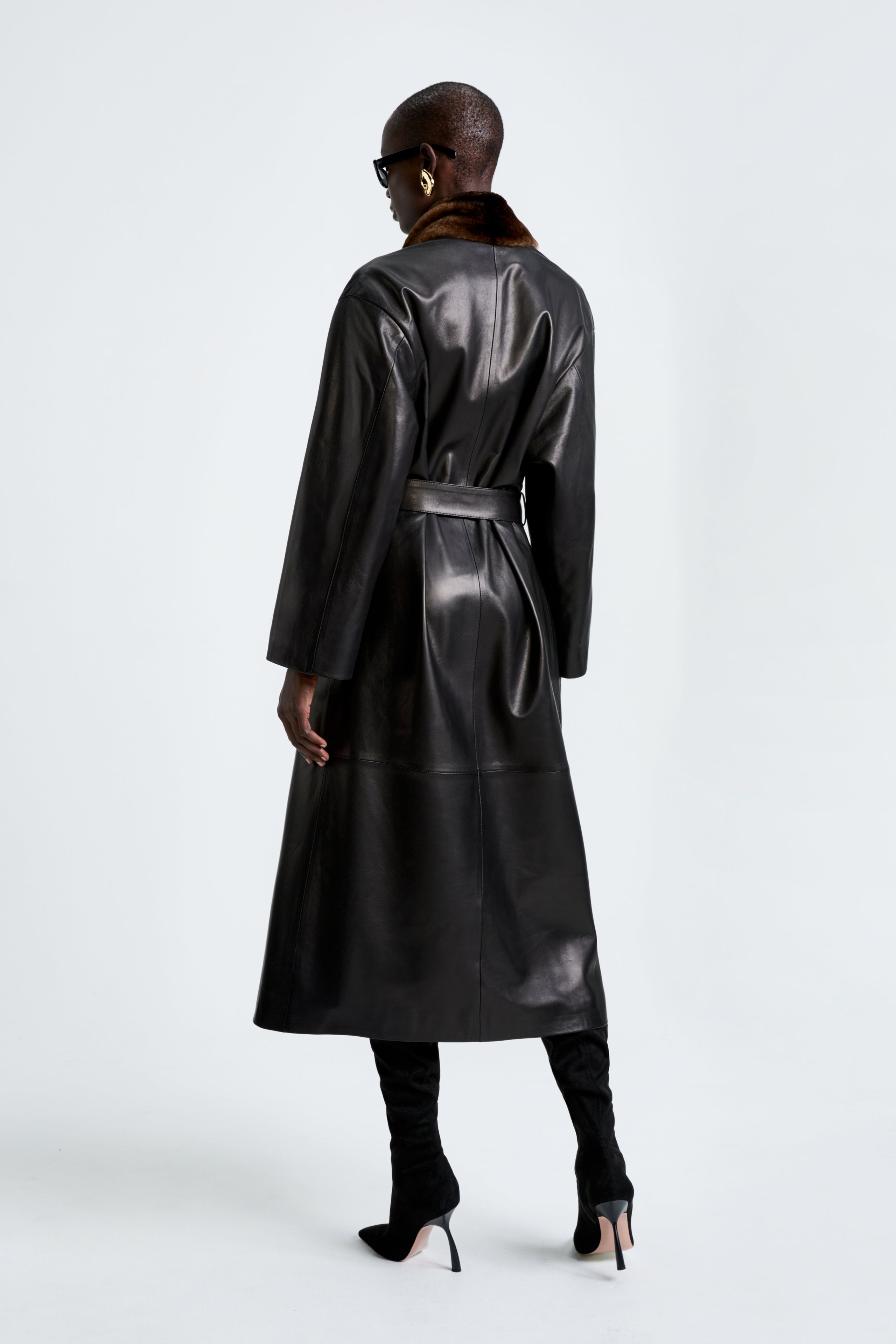 Model is wearing the Nour Hammour Vivian Black Chinchilla - Elegant Leather Trench - Back