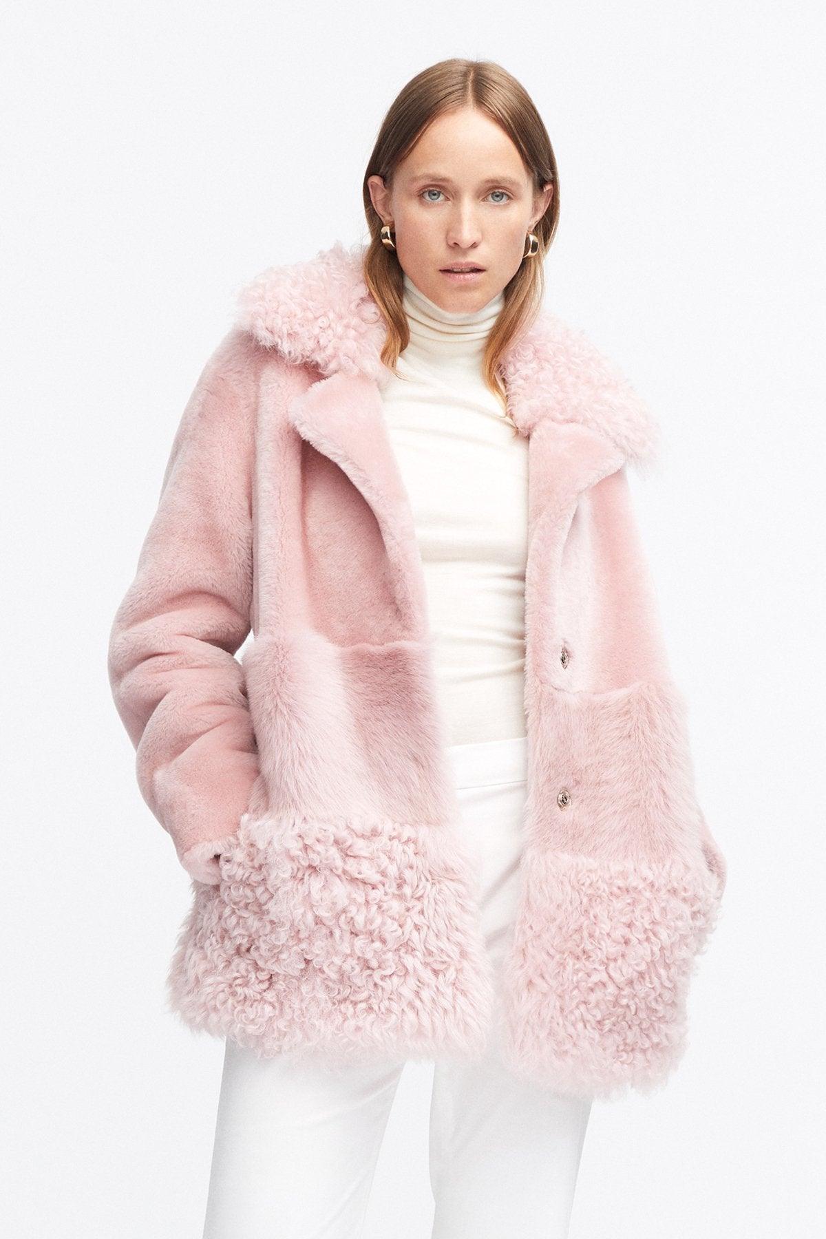 Model is wearing the Anouk Dusty Pink Luxurious Shearling Coat Close Up