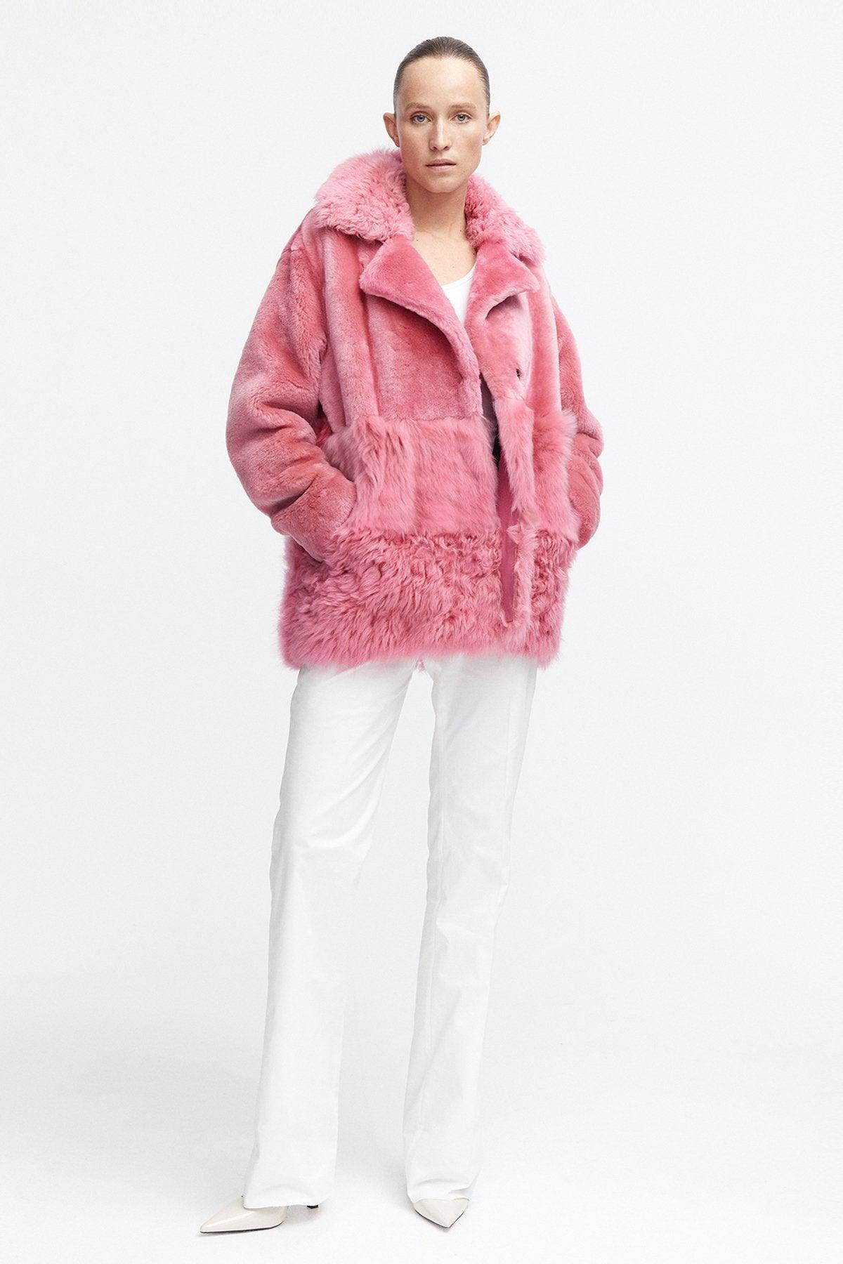 Model is wearing the Anouk Taffy Pink Luxurious Shearling Coat Front