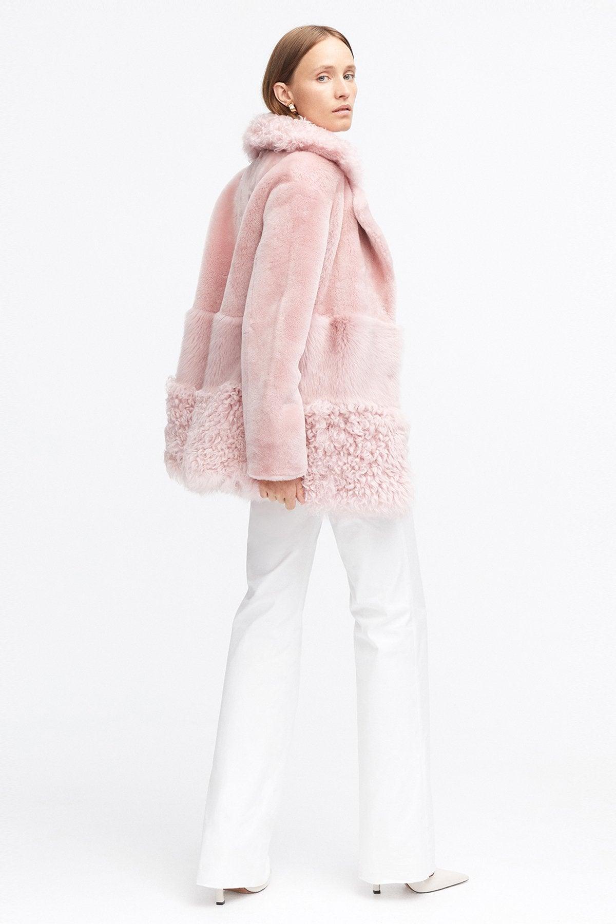 Model is wearing the Anouk Dusty Pink Luxurious Shearling Coat Back