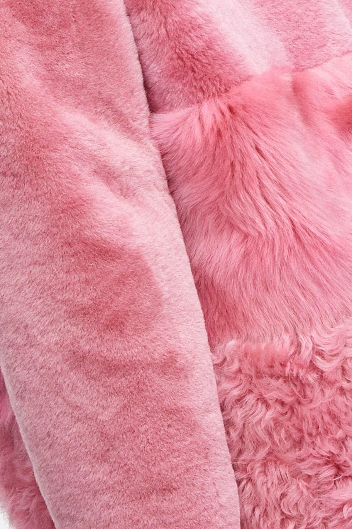 Model is wearing the Anouk Dusty Pink Luxurious Shearling Coat Close Up