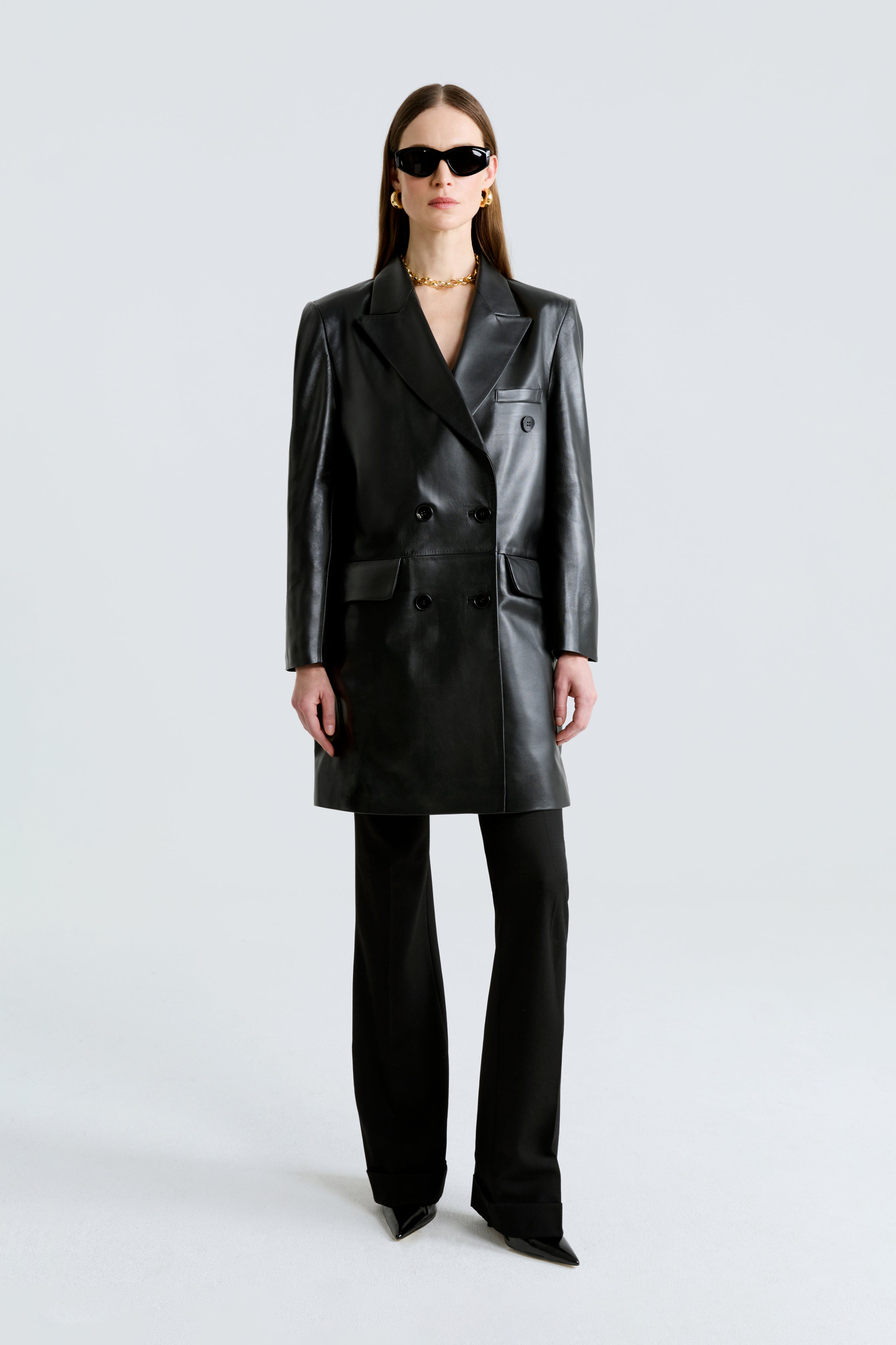 Model is wearing the Edie Black Double-Breasted Leather Coat Front