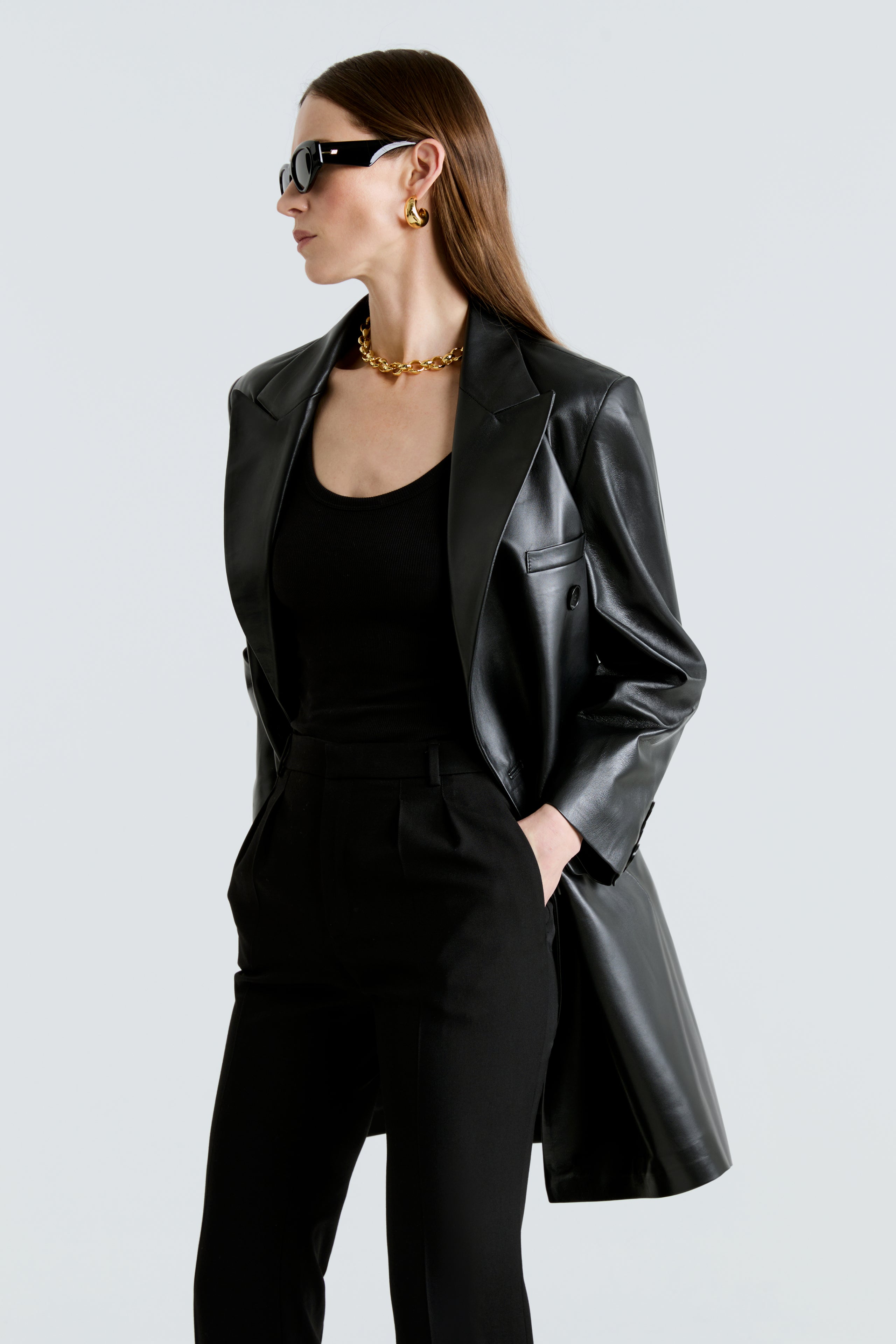 Model is wearing the Edie Black Double-Breasted Leather Coat Close Up