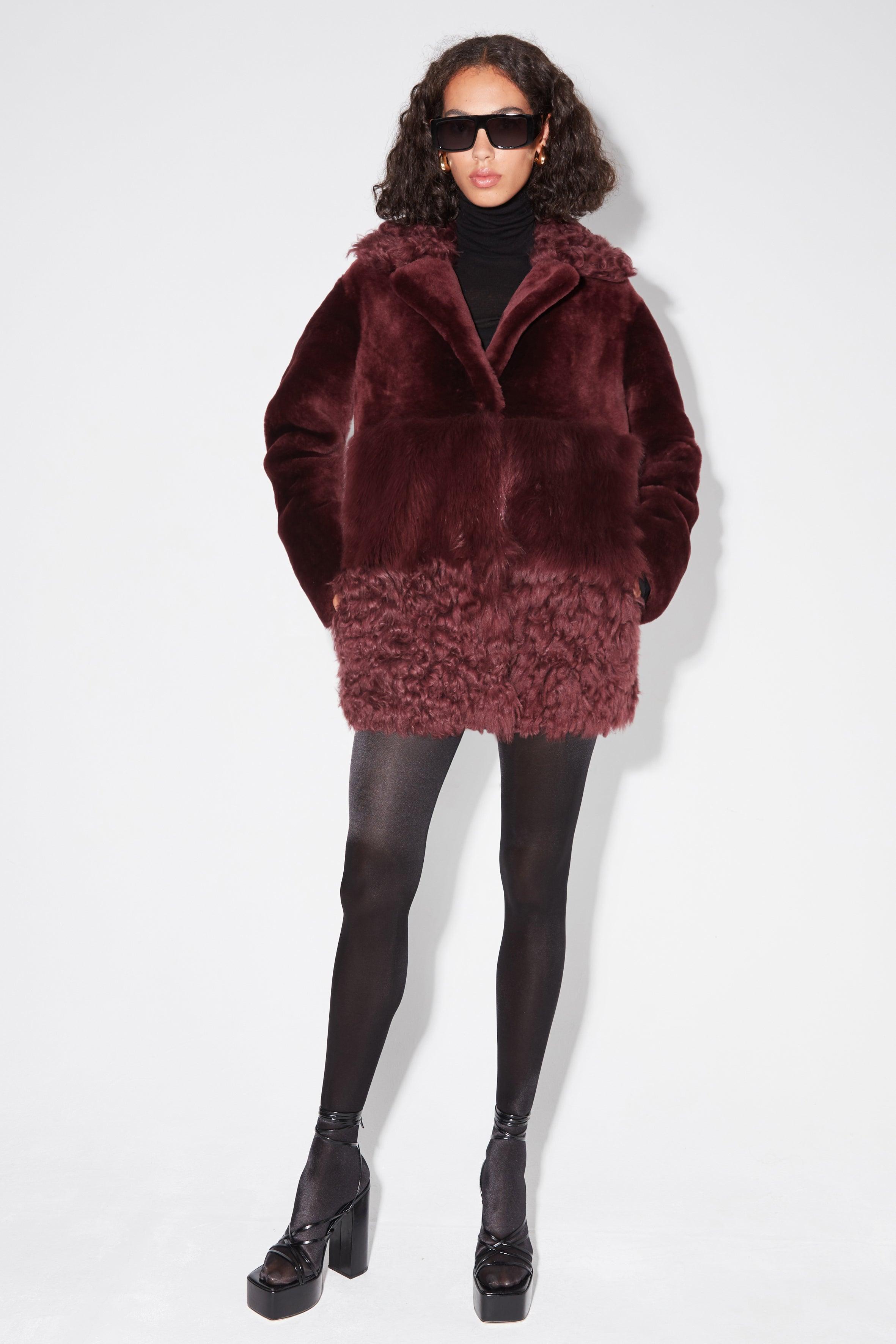 Model is wearing the Anouk Mulberry Luxurious Shearling Coat Front