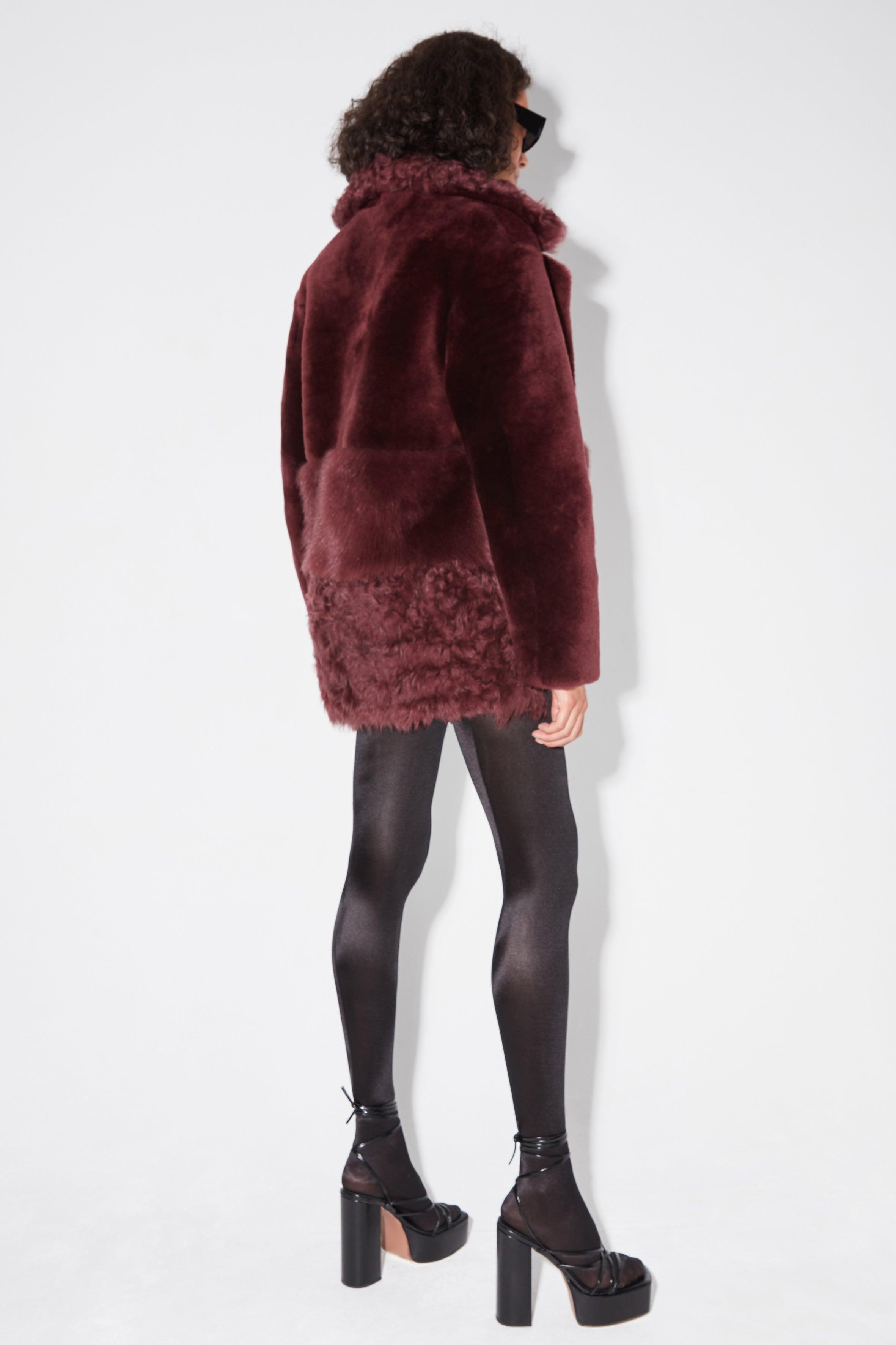 Model is wearing the Anouk Mulberry Luxurious Shearling Coat Back