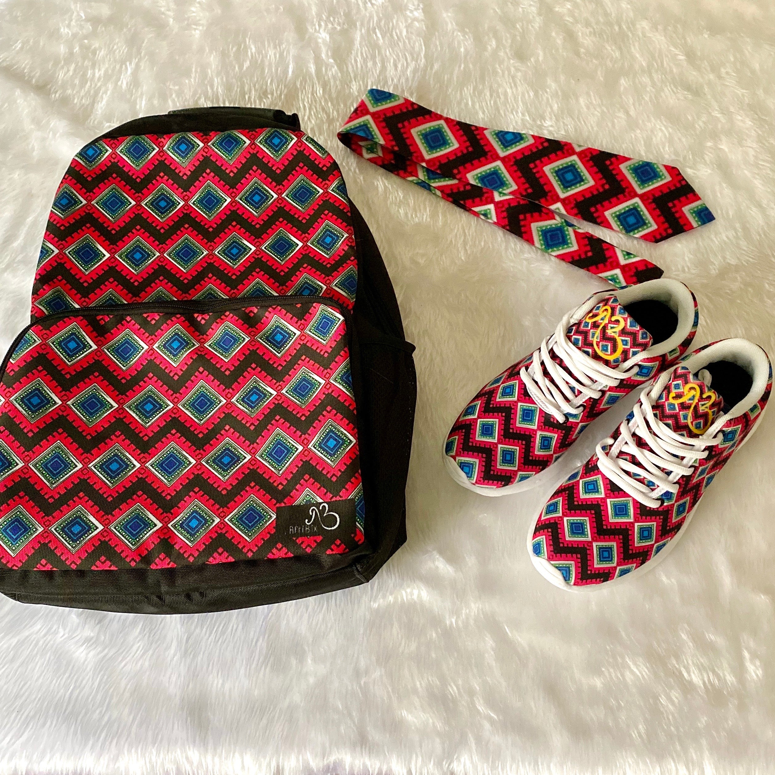 flyersetcinc backpack and trainers in african print