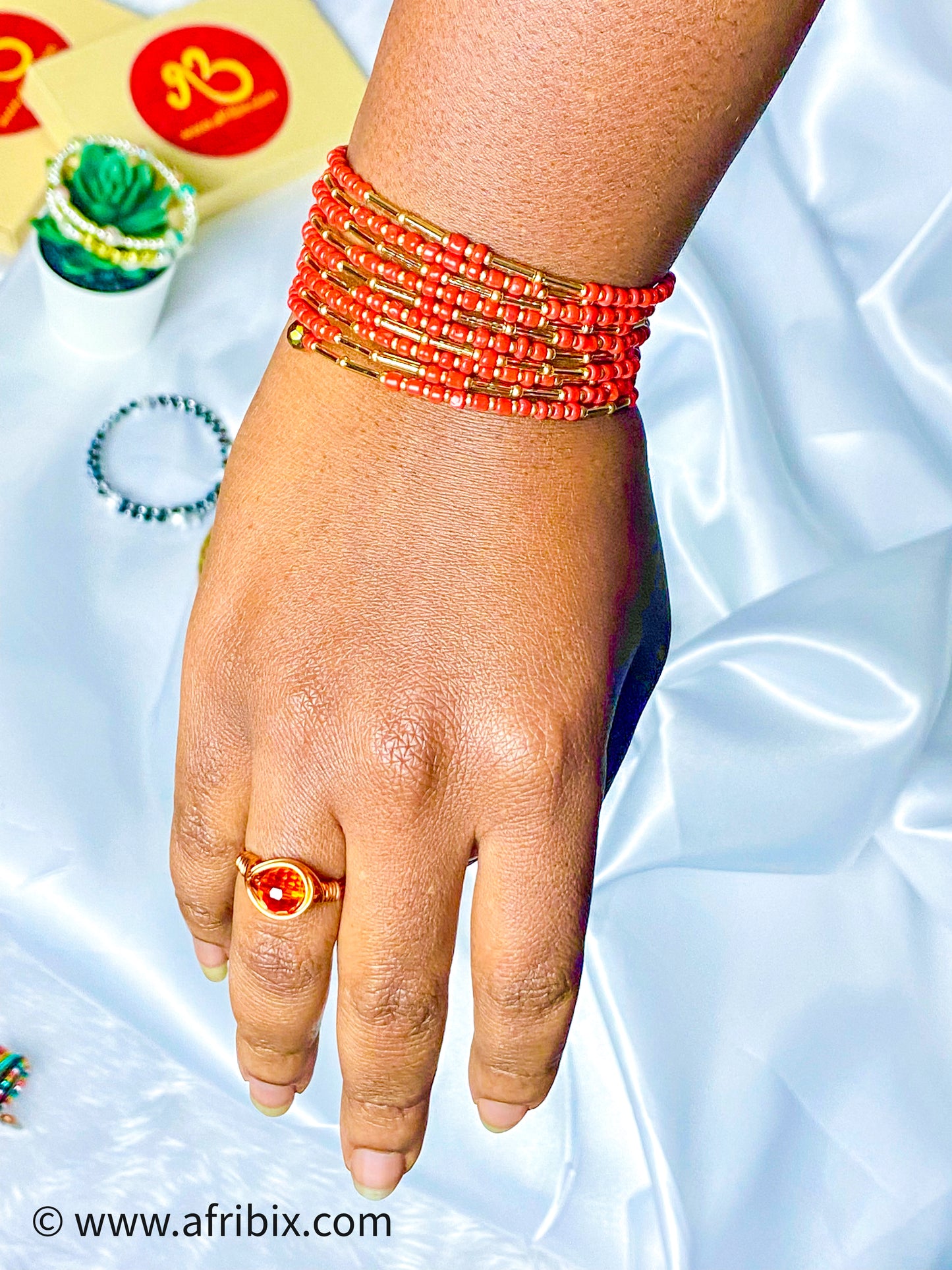 Coral and Gold Spiral Bracelet