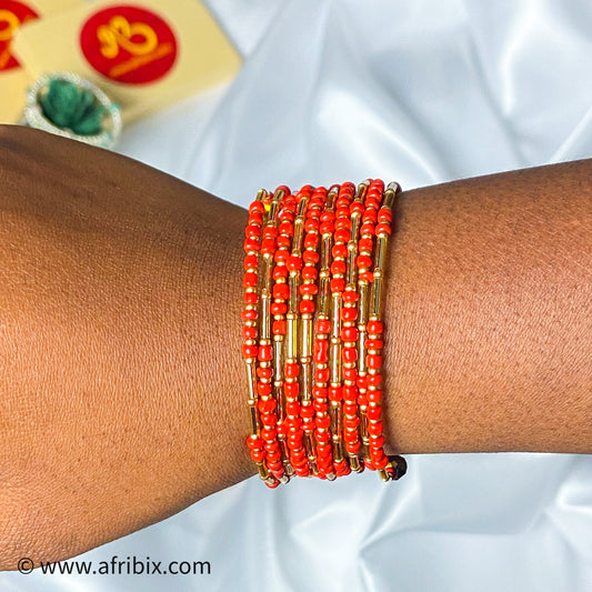 Coral and Gold Spiral Bracelet