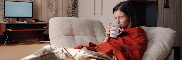 sick woman mug of elderberry tea