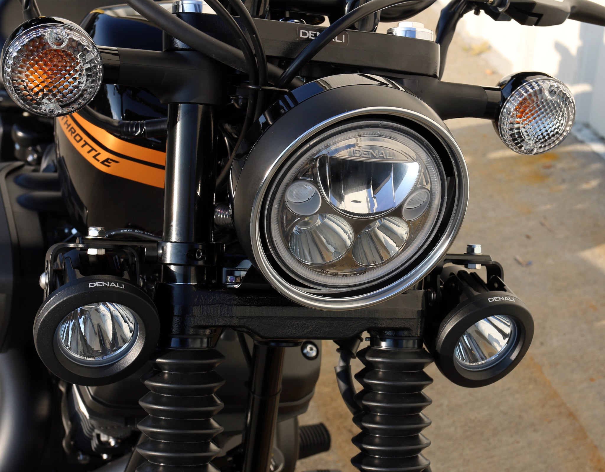 M7 LED Headlight mounted in factory headlight bucket & DR1 Light Kit mounted using the Universal Fork Tube Light Mount