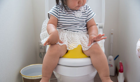 Learning to Potty Train - Girl on toilet