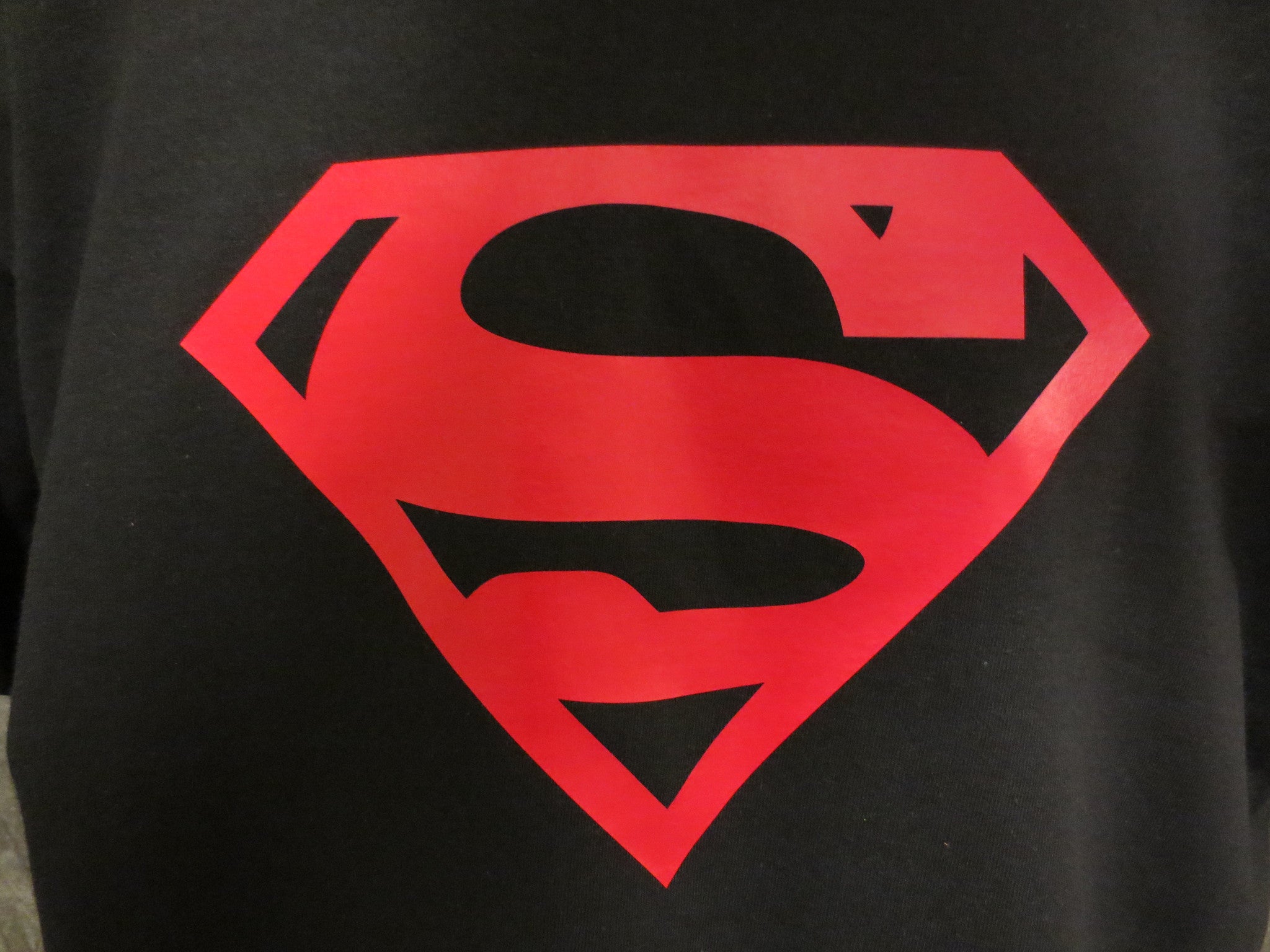 black superman t shirt with red logo