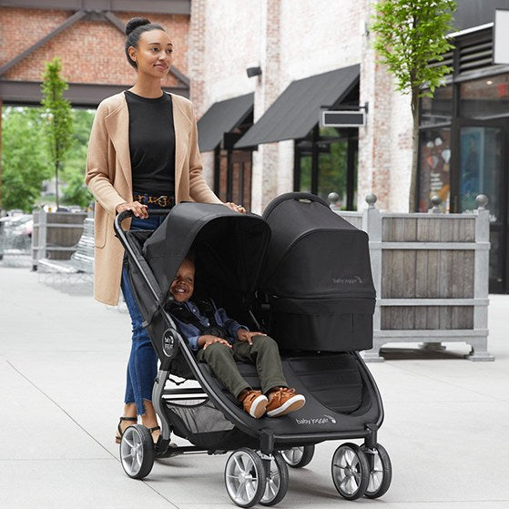 Person - Baby Jogger City Mini 2 Double Baby Stroller, Jet