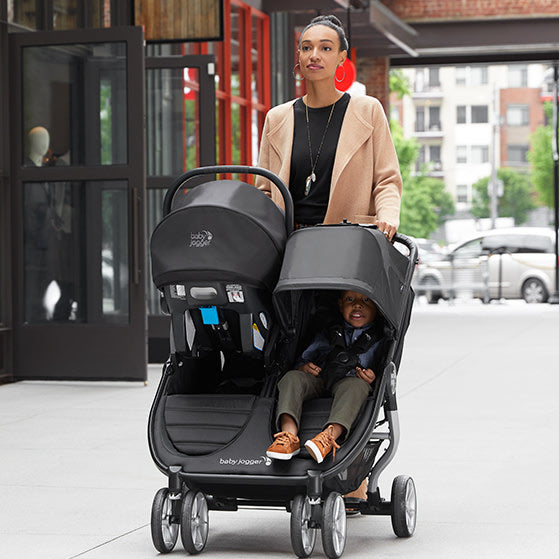Person - Baby Jogger City Mini 2 Double Baby Stroller, Jet
