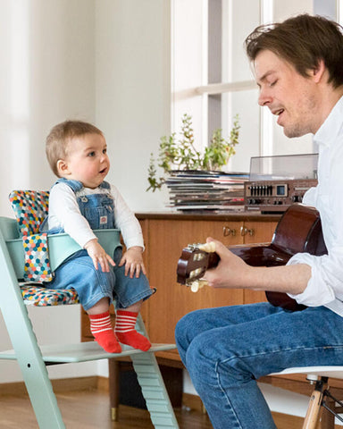 Person - STOKKE Tripp Trapp Oak High Chair