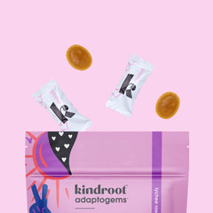 Kindroot lozenges flying out of a bag