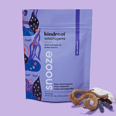 Kindroot Snooze lozenges packaging next to melatonin powder and ashwagandha