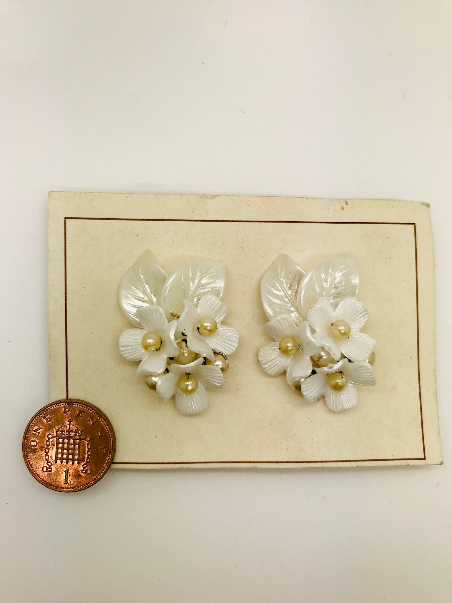 Authentic Vintage 1940s-50s Clip On White Floral Acrylic Resin Earrings by The Schein Brothers product