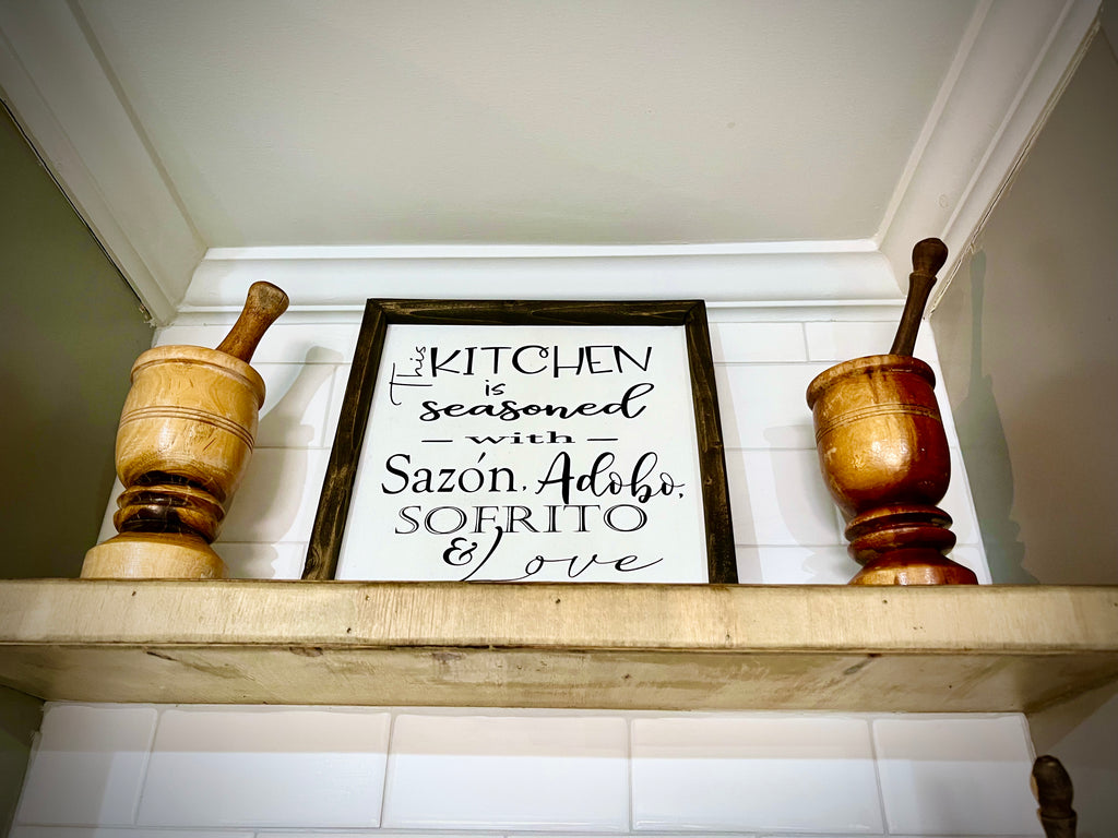 This kitchen is seasoned with sazón, adobo, sofrito, and love sign, kitchen sign, pilones, shelf