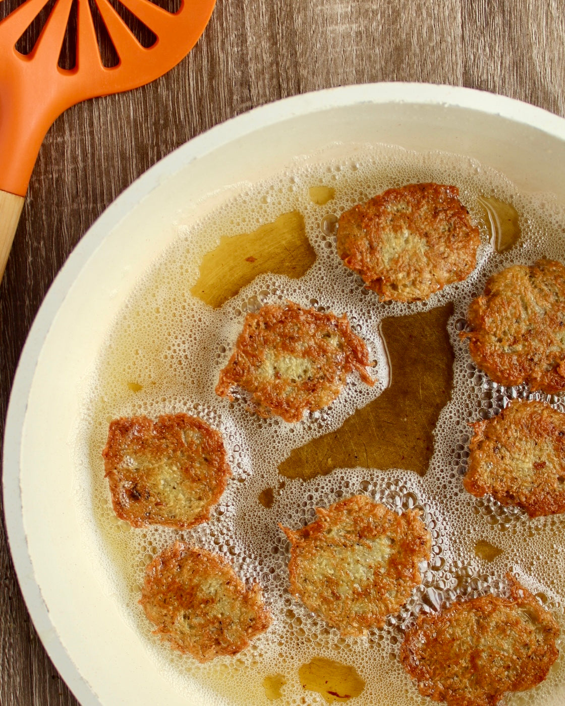 Malanga Fritters frying in oil