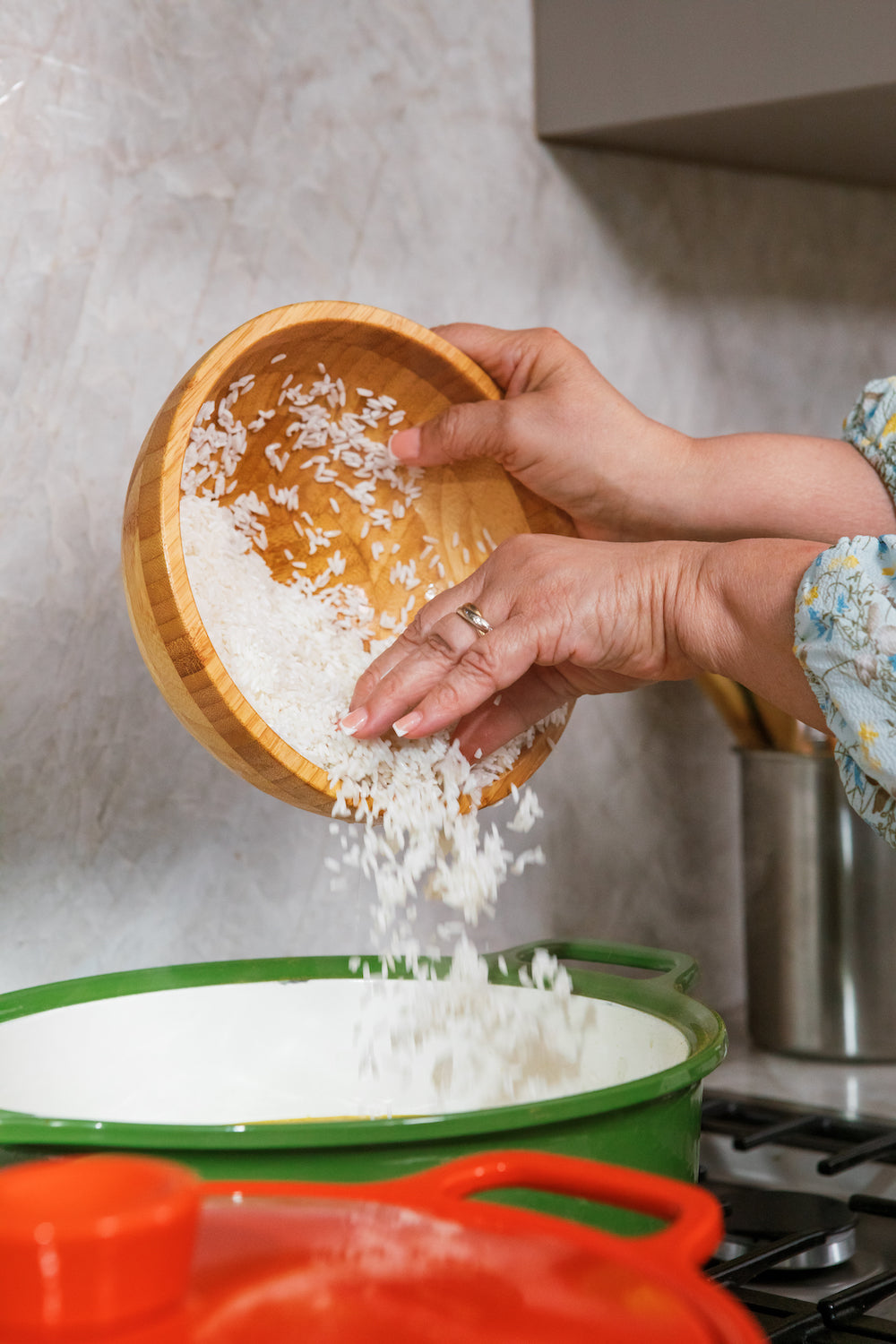 Pouring rice into pot