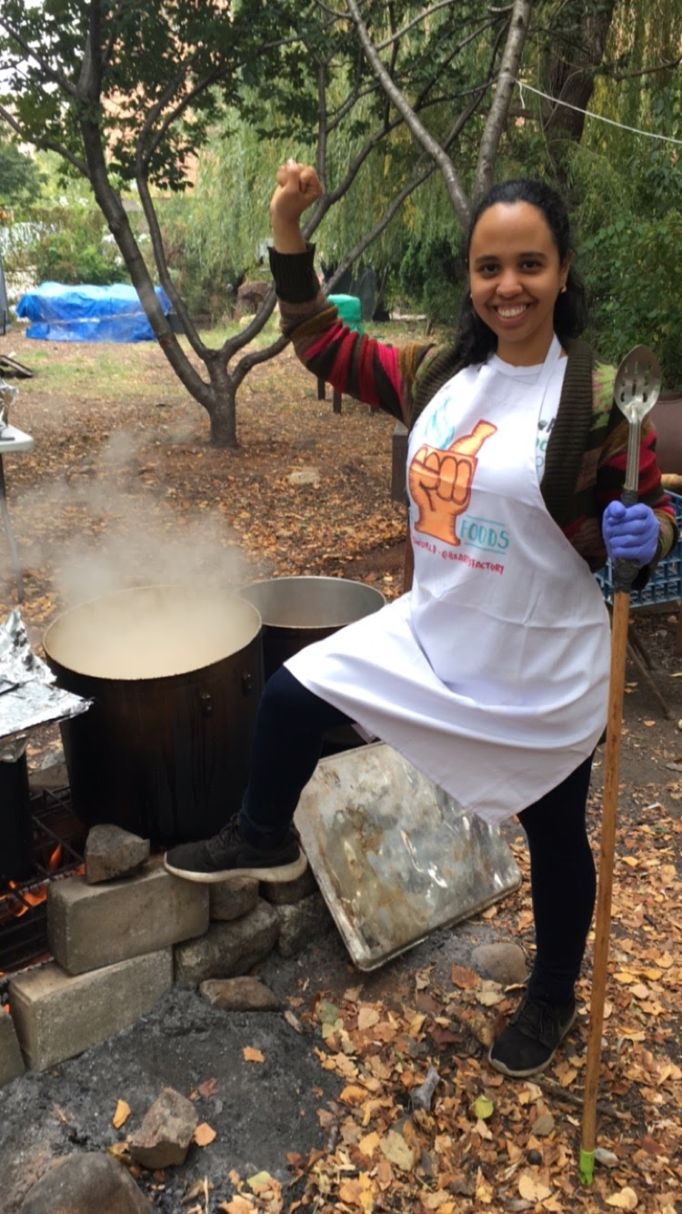 Merelis with pot of sancocho