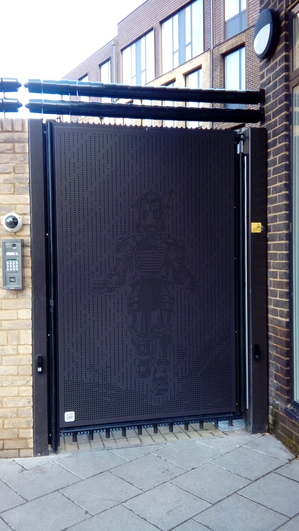 Double Roller Barrier with steel Robot decorated gate cover plate.