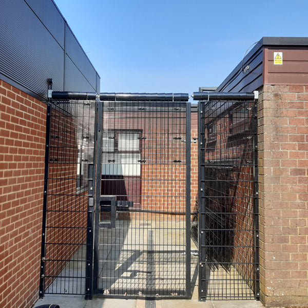 large format mesh security fence with roller barrier