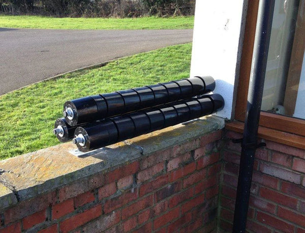 trigard roller barrier protects low level wall