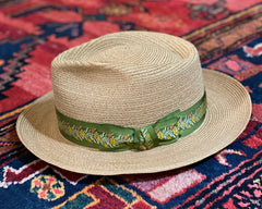 choose a light brown or dark natural hat to mask staining