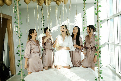 bridesmaids and bride getting ready