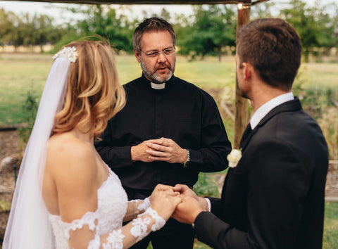 priest officiating a wedding