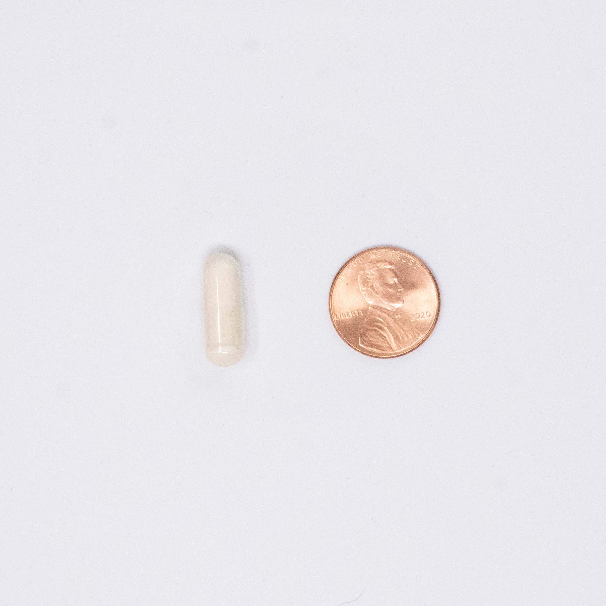 Vitamin D pill compared size to a penny