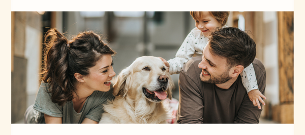 family with their dog