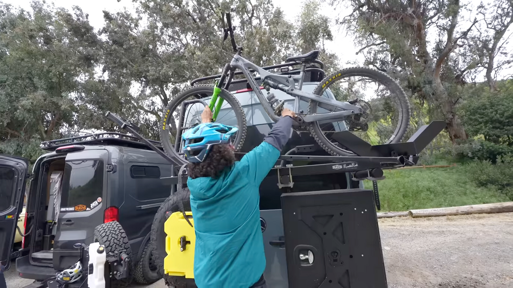 Lifting bike to van door bike rack