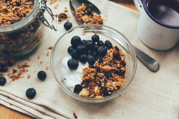 bowl of yogurt with granola and fresh fruit