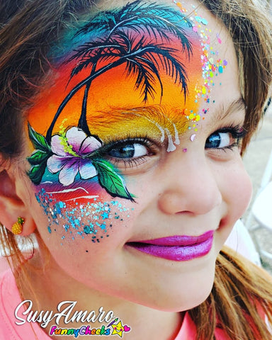 Smiling girl with heart shaped face paint sitting by her birthday cake  Stock Photo - Alamy