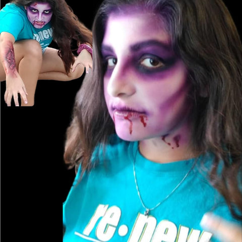 Ana Ochoa - Face Painting San Antonio zombie or vampire scary face paint idea