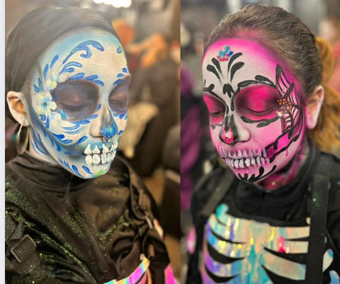 Angie Garcia Glitter Brush Face Painting blue and pink sugar skulls