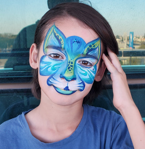 Blue tiger face paint - Anna Wilinski on Angelo