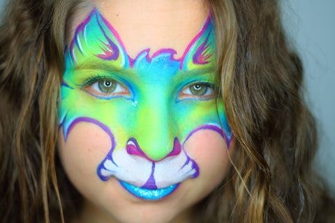 Anna Wilinski Face Paint Design of a Green And Blue cat on Oceana