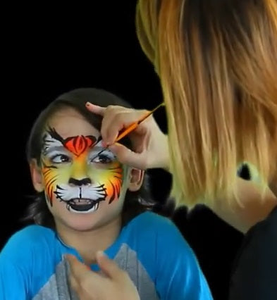 Painting Angelo as a tiger