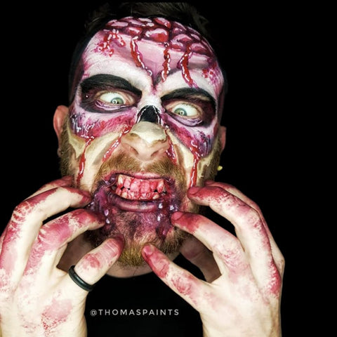 Thomas Paints Zombie makeup with brains exposed