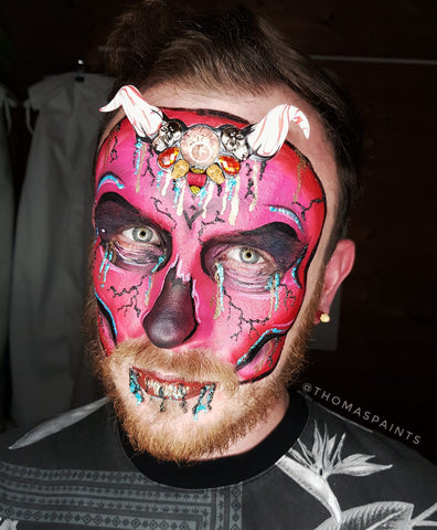 Thomas' Face Painting thomaspaints red skull with horns and bling.jpg