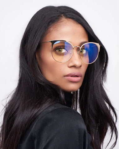 Woman wearing stylish blue light glasses