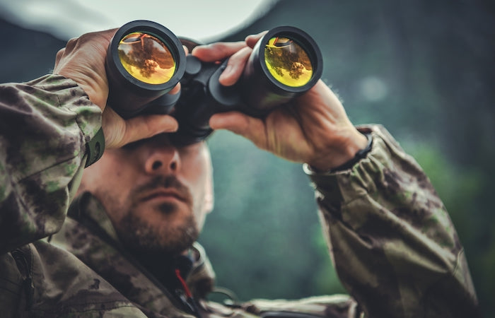 army soldier with binoculars