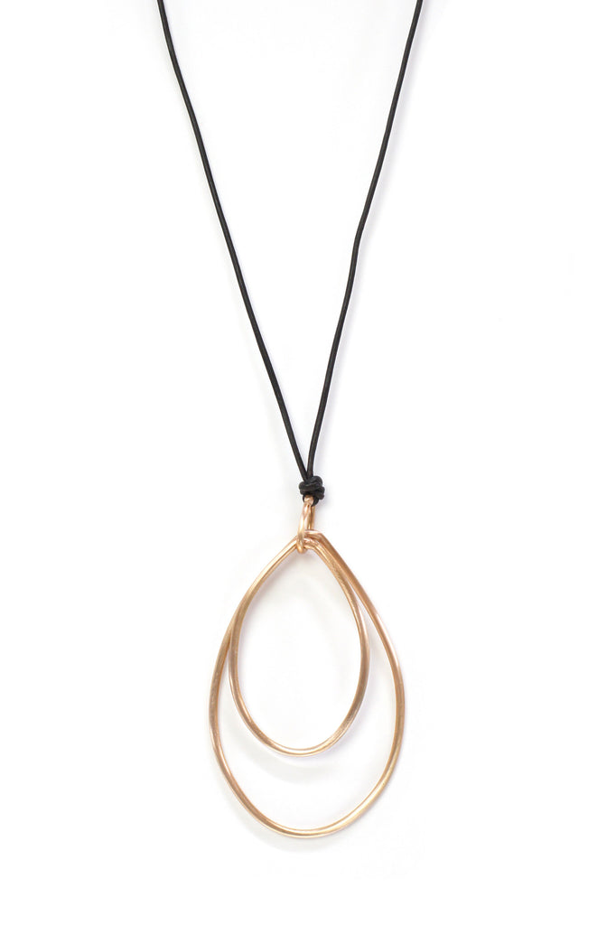 Eva pendant // long metal and leather cord necklace - megan auman